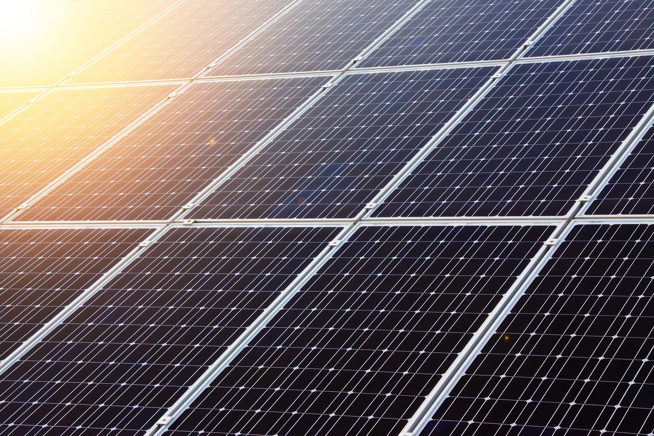 A close up of some solar panels on the ground